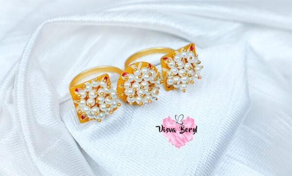Golden pearls rings